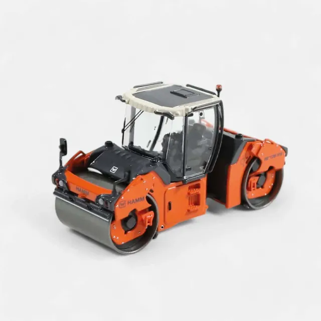NZG Hamm HD+ 120i VO compacteur 1/50 cabine vitrée