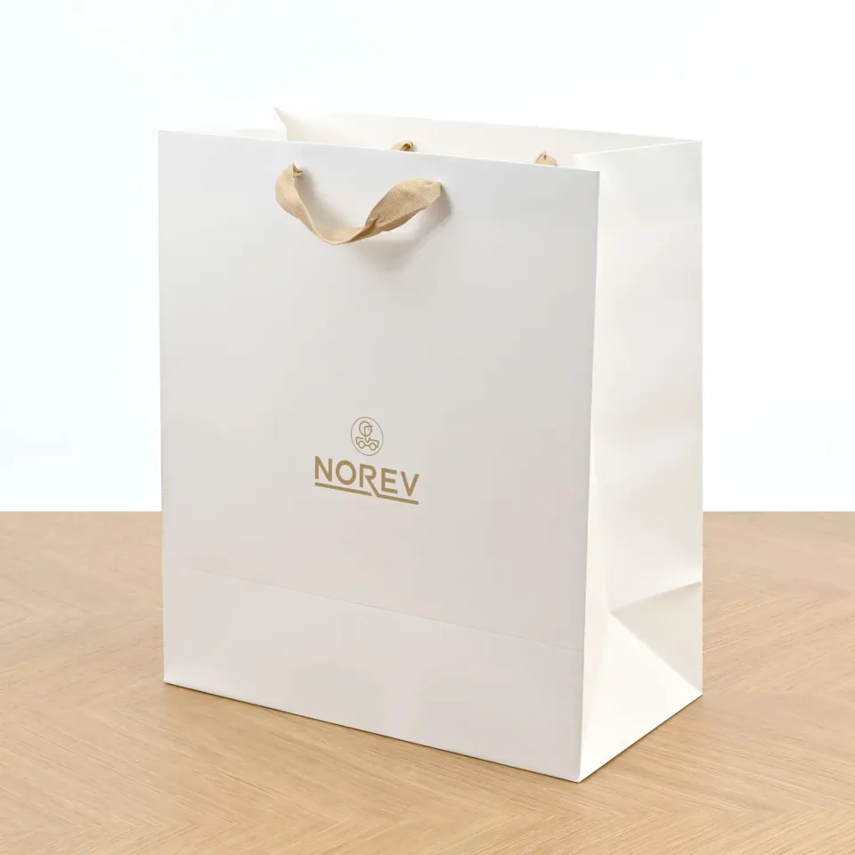 Norev sac papier blanc mat 35x18x40cm 2 miniatures 1/18